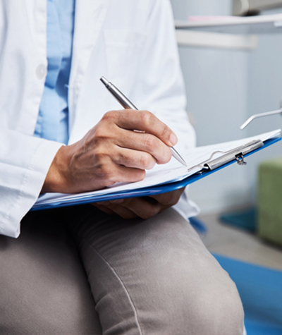 Dentist taking notes